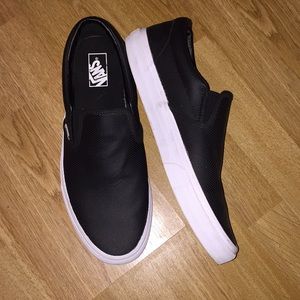 Vans perforated leather slip ons